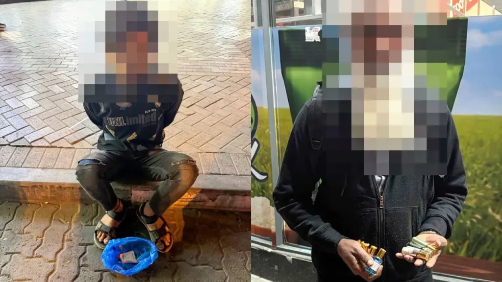 Dubai Police officers questioning suspected beggars during an anti-begging operation in Dubai